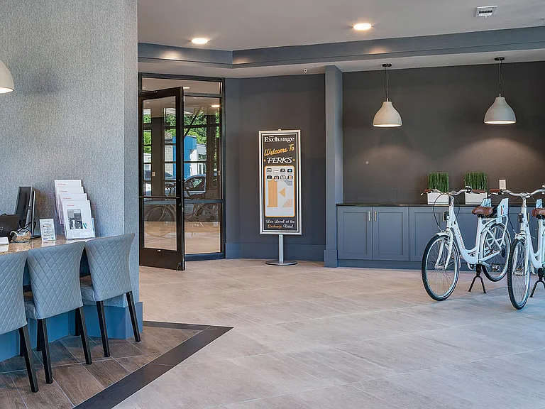 Experience the elegance of our apartment lounge, complete with convenient bike sharing options.