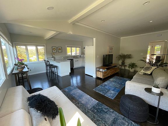 Open plan kitchen and living room area with nice views