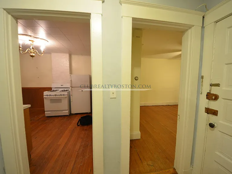 hallway facing kitchen living room