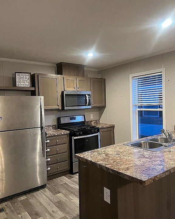 1st image of 534 E 37th Ave Lot 220