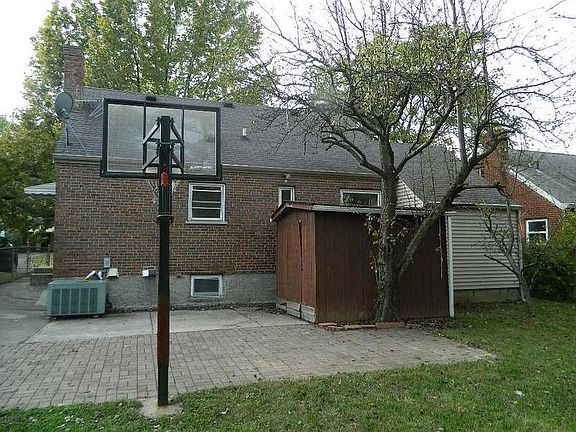 Back of House and Shed - Baseball Hoop Gone