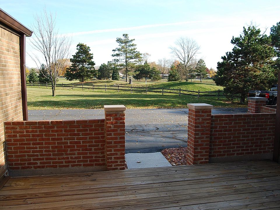 LOOKING OUT ON THE GOLF COURSE FROM THE DECK