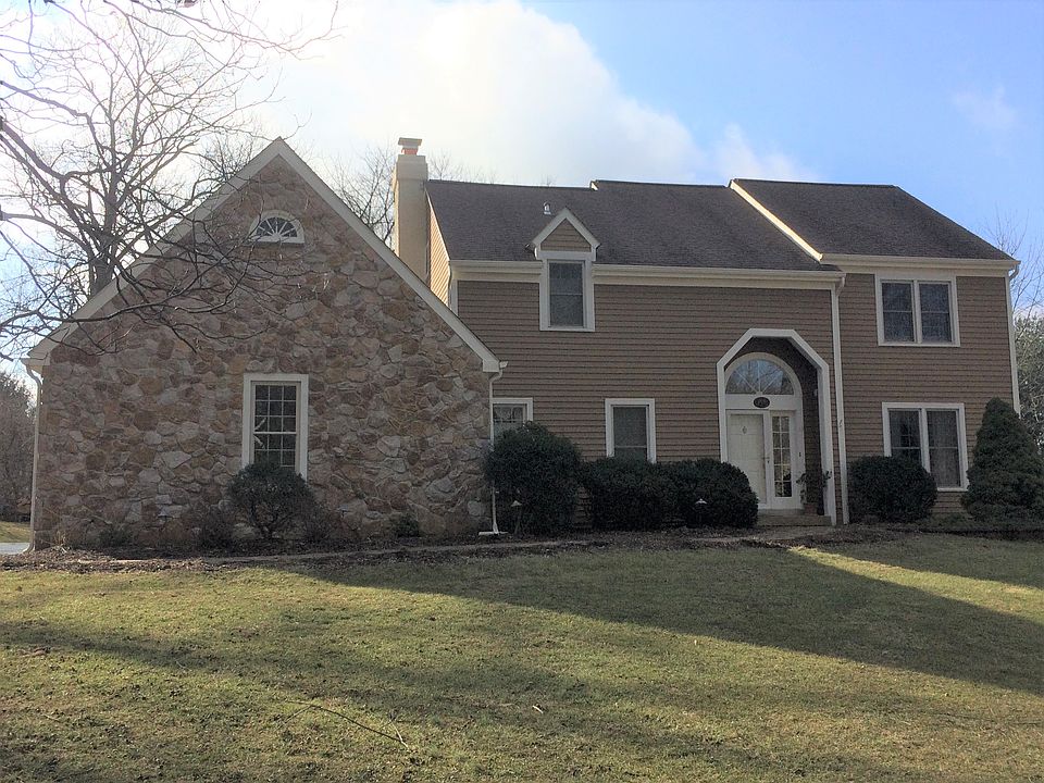 Cedar siding, stone facade