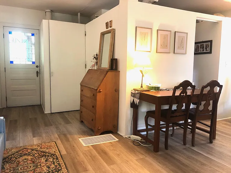 Main level back entrance through screened-in porch, office area