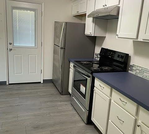 A separate door to the porch and leasds to the backyard.
