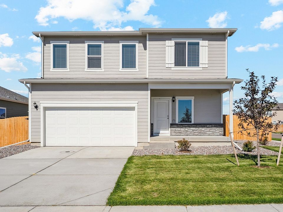 The Yale floor plan is a beautiful two-story home with three bedrooms and two and a half bathrooms.