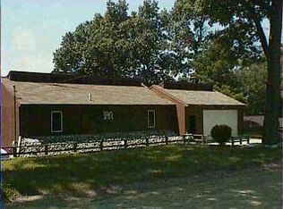 7933 E Lake Rd, Holton, MI 49425