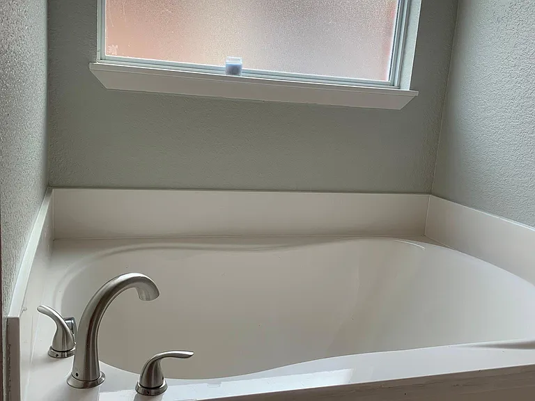 There is a garden tub across from the shower for those days when a good soaking is needed.