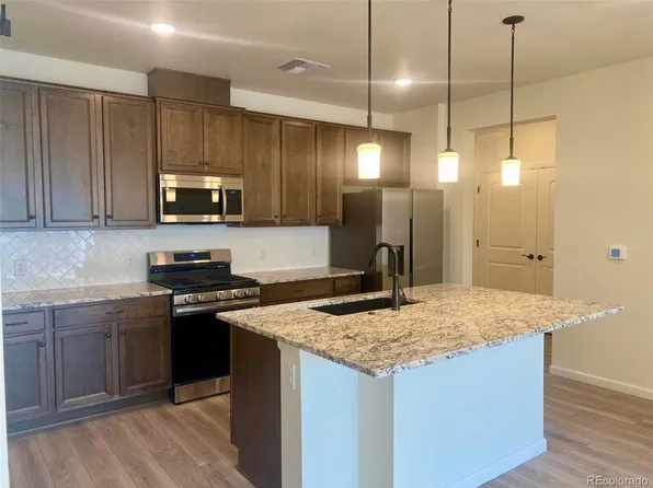 6153 N Ceylon Street Bldg 8 #303, Denver, CO 80249
