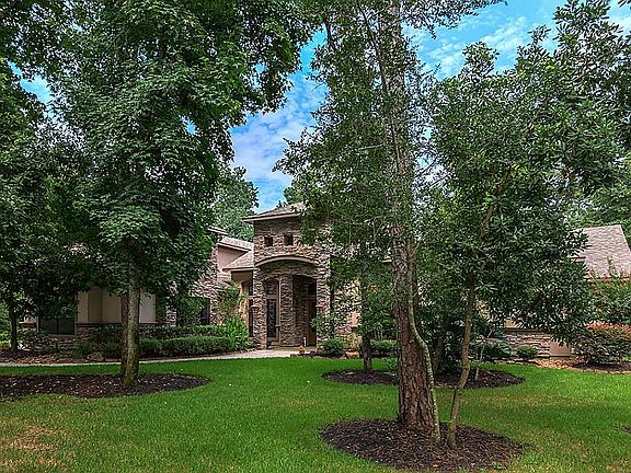Lovely hardwoods surround the property - giving you cool shade and privacy.