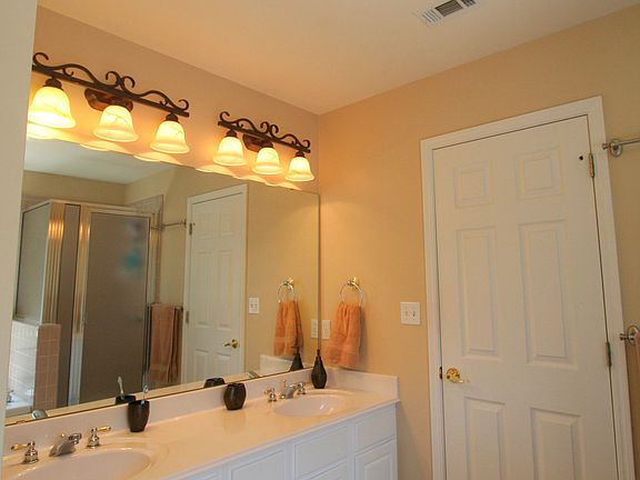 Master bathroom features his