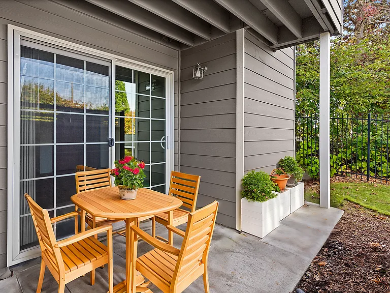 Enjoy serene moments on this charming patio, perfect for outdoor gatherings.