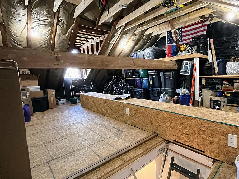Expanded (30" x 54") attic access with fold-down ladder.