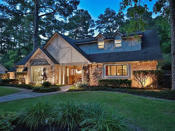 Behind the traditional charm of this Huntwick Forest home lies a designer showcase with all the conveniences you desire in a new home. Unlike new construction, this established neighborhood offers mature trees and landscaping, delightful gas lanterns