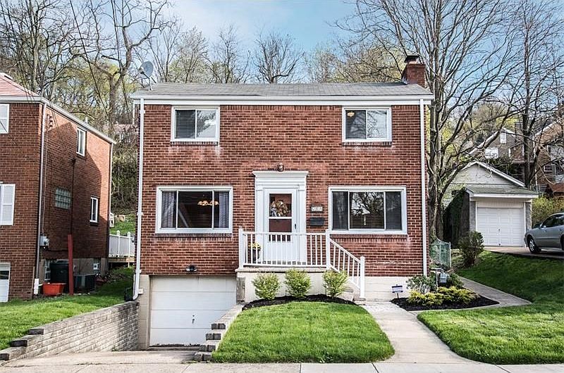 Nicely updated brick home with 1 car garage.