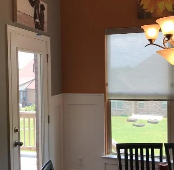 Dinning room showing the Gray and Orange walls