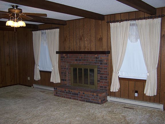 living rm w brick fire place