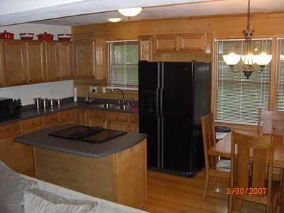 Kitchen Features Center Island/Eat-in Area and Open Floor Plan to Great Room.