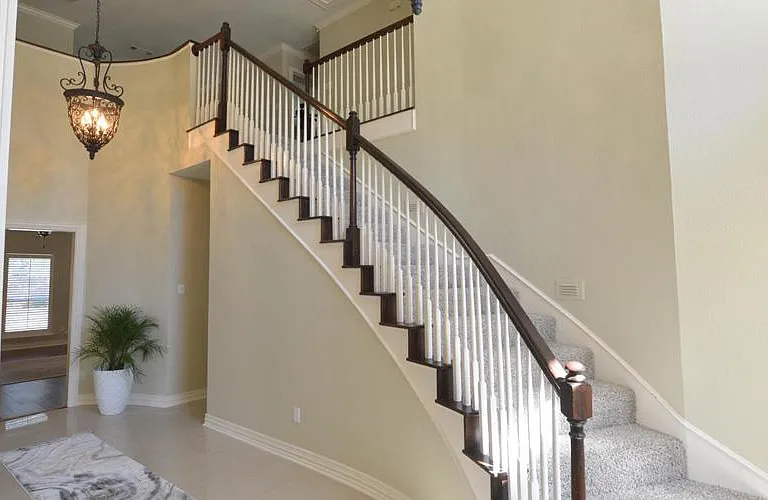 Winding two story stair case