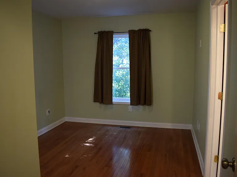 Middle Bedroom with suite style bathroom attached