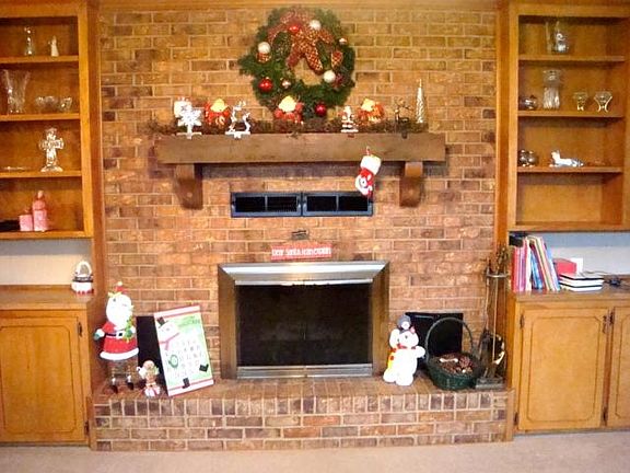 Cozy fireplace with built-ins.