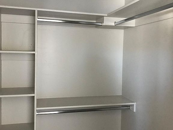 Large closet in master bedroom.