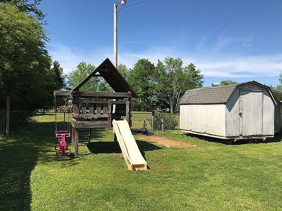 Wooden playground playhouse