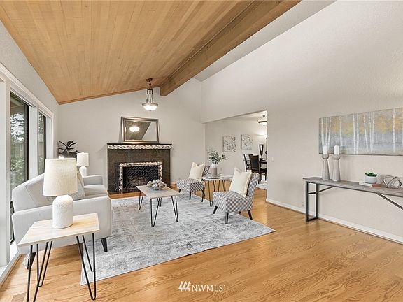 Cosy gas fireplace makes this fornt room a perfect entertaining space
