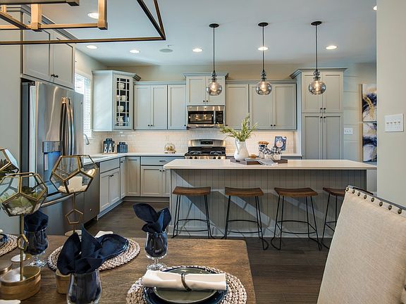 Expansive central island and furniture grade cabinetry