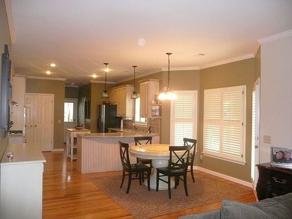 Eat-in area nestled between the breakfast bar and a charming great room.