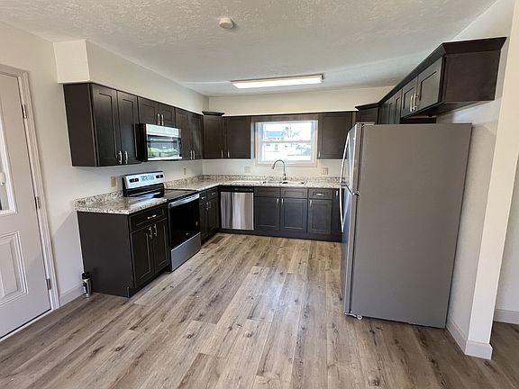 New Cabinets, new stainless steel appliances including dishwasher