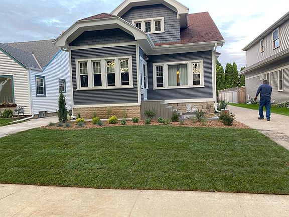 Freshly painted, new porch and new landscaping and front lawn