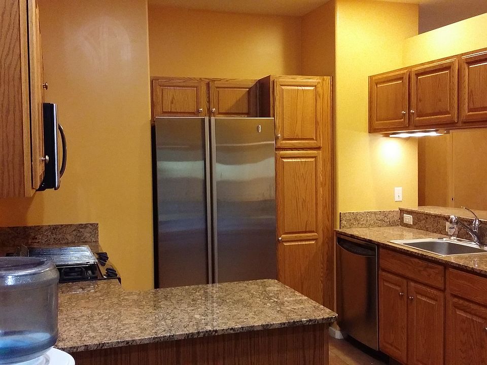 Kitchen opens up into living room.