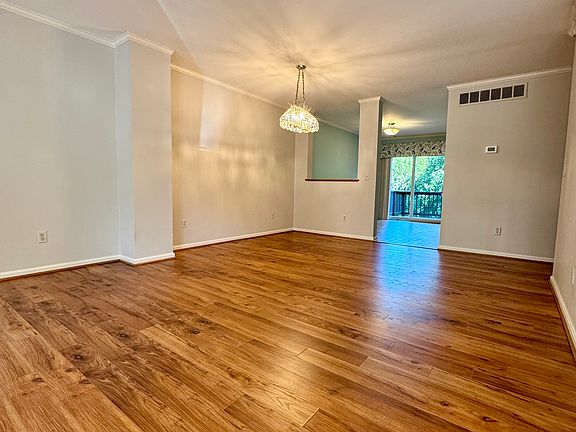 Bright living room featuring durable laminate wood floors