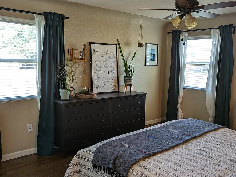Upstairs master bedroom w/ king sized bed