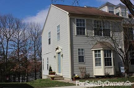 Front/Side View
						:
						End Unit lots of space, wooded background, lots of privacy.