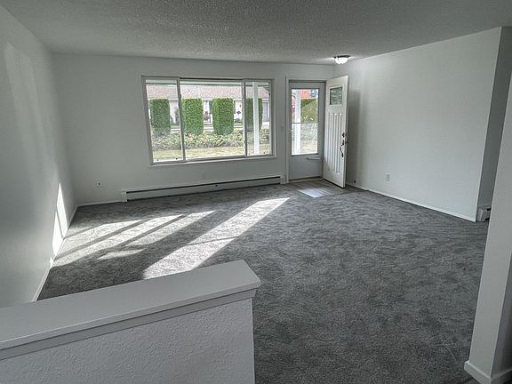 Bright and spacious main living room _ perfect for relaxing or entertaining.