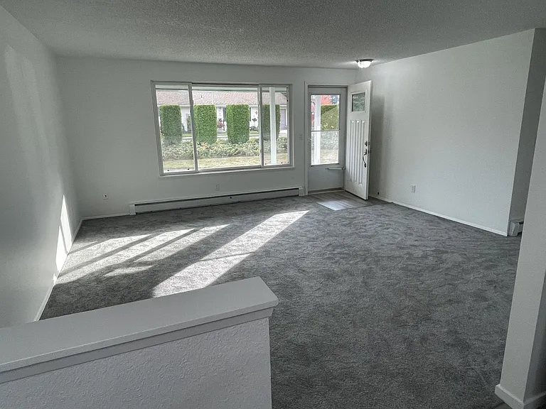 Bright and spacious main living room _ perfect for relaxing or entertaining.