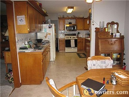 Kitchen lots of counters and cabinets