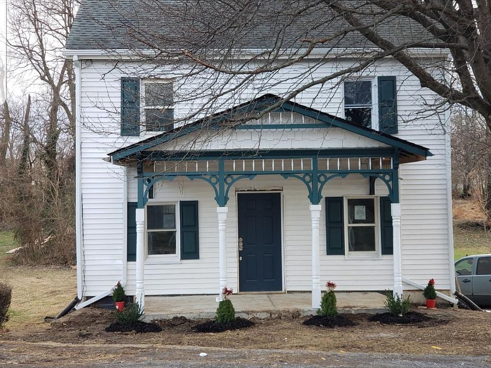 This is now a pic of the front of house after renovation. I will try to add photo of rear lower apartment