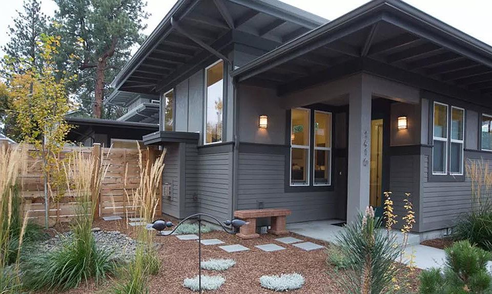 Beautiful mid-century modern designed two-story home in the heart of Bend's west side. NOTE: the bench featured in picture is no longer on the property.