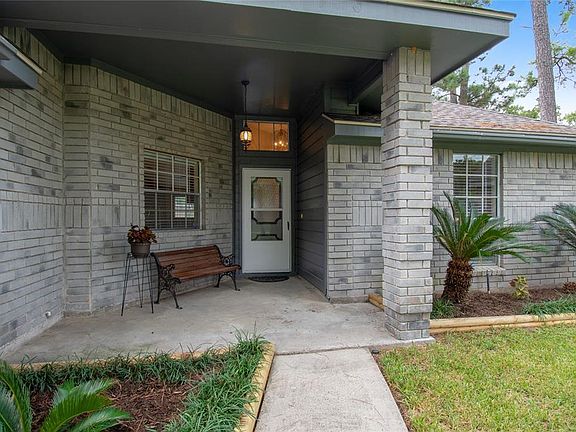 When you step into the open entry way, you notice the high ceilings and grand chandelier!