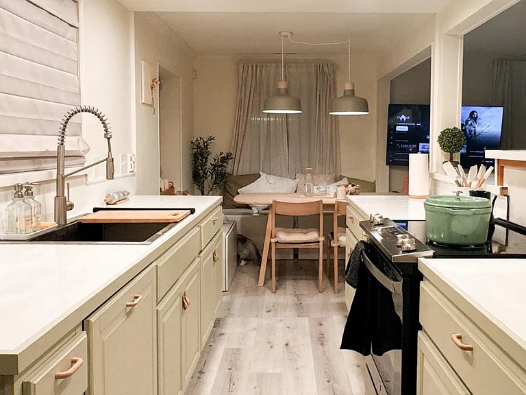 Newly remodeled kitchen with built-in Bosch dishwasher, oversize sink, GE range