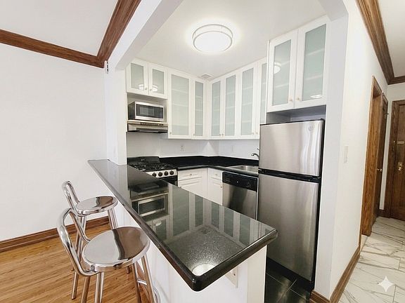 2nd image of 238 E 36th St APT 2H