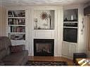 bookcase framed fireplace