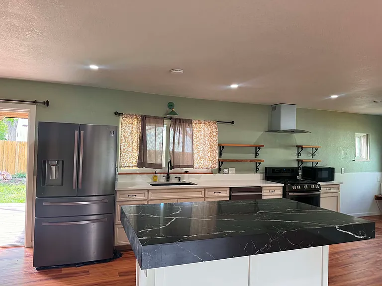 3435 S Hudson Way — Photo 1