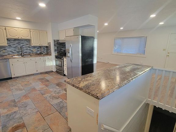 Kitchen looking to living room