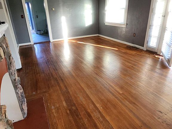 Living and dining room without furniture.