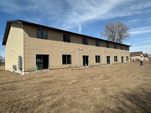 Backyard - concrete patios and privacy fences coming soon.