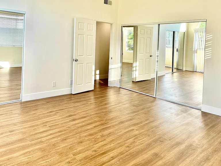 Master Bed room with two large mirror closets